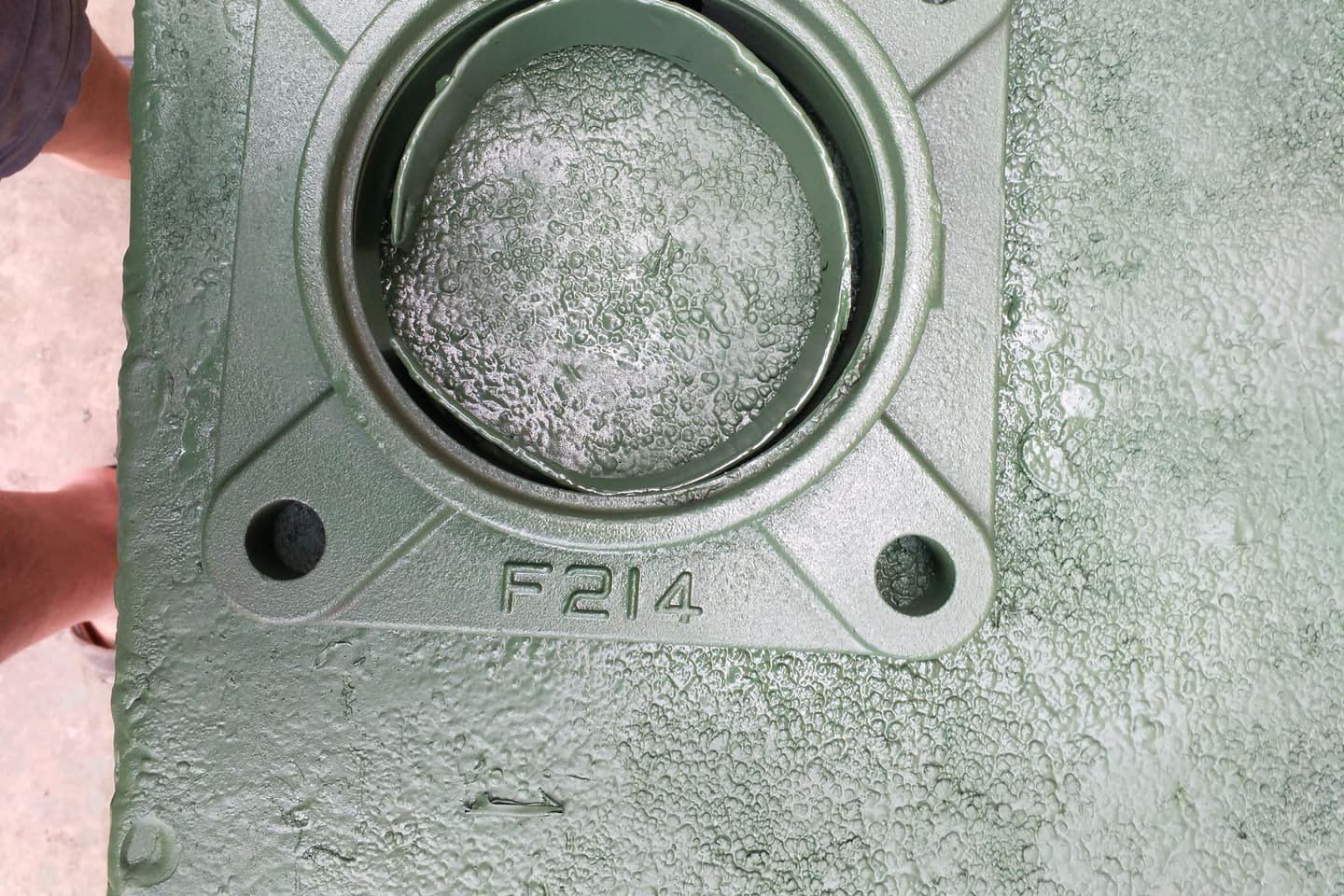 Four-bolt flange housing marked F214